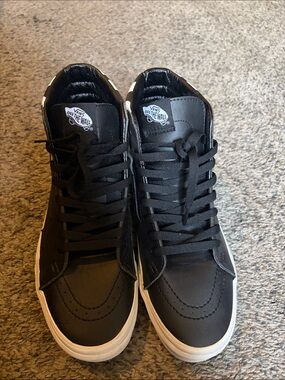 Vans Men’s Black High-Top Sneakers with White Sole